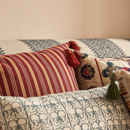 Rumeli and Meknes Stripe Cranberry Old Gold Cushion with Red Tassels